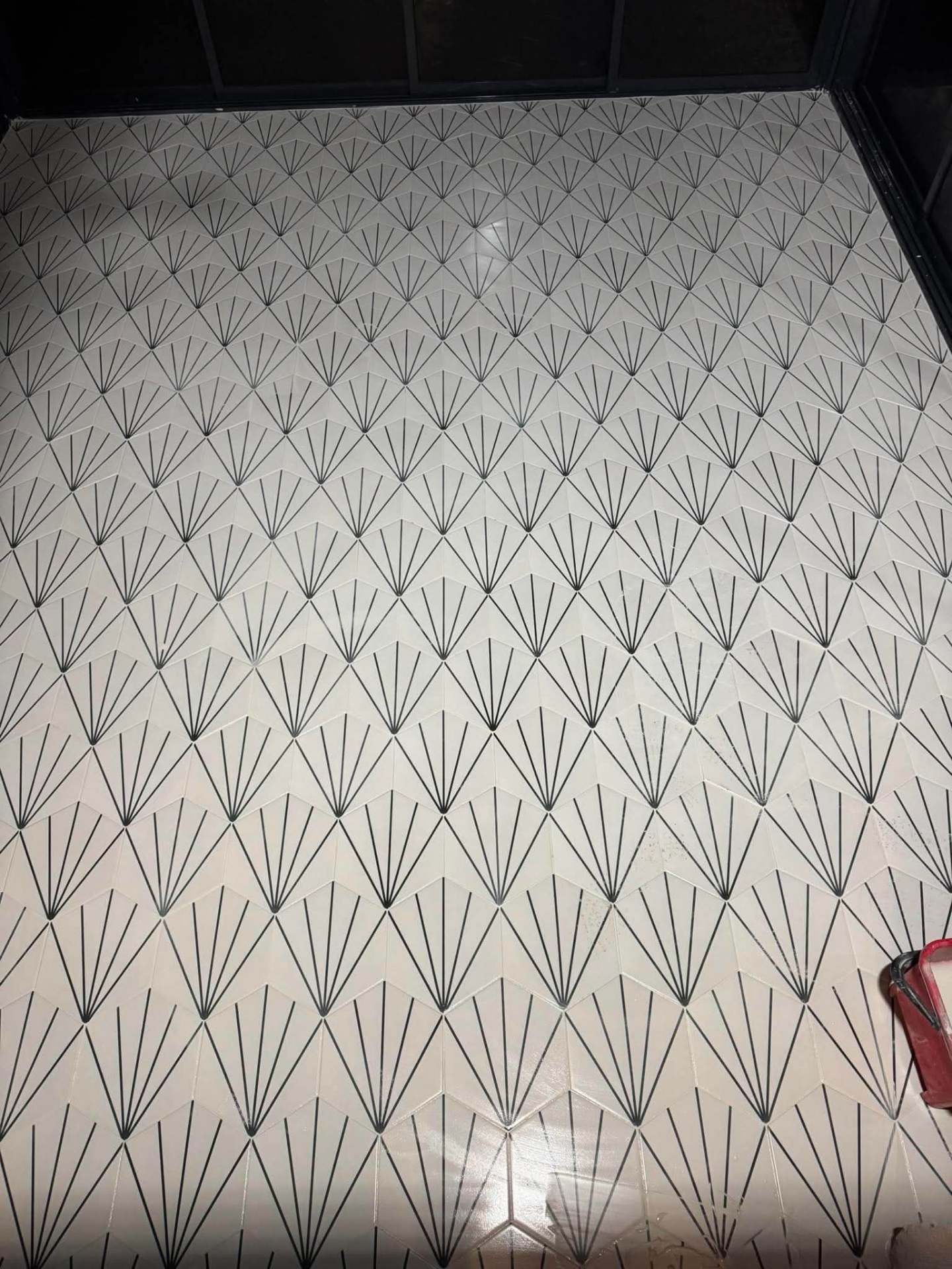 Art-deco fan mosaic feature floor, finished and grouted dark